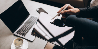 man working tablet close up table