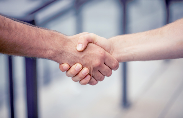 side-view-photo-two-men-s-handshake-outdoors-2